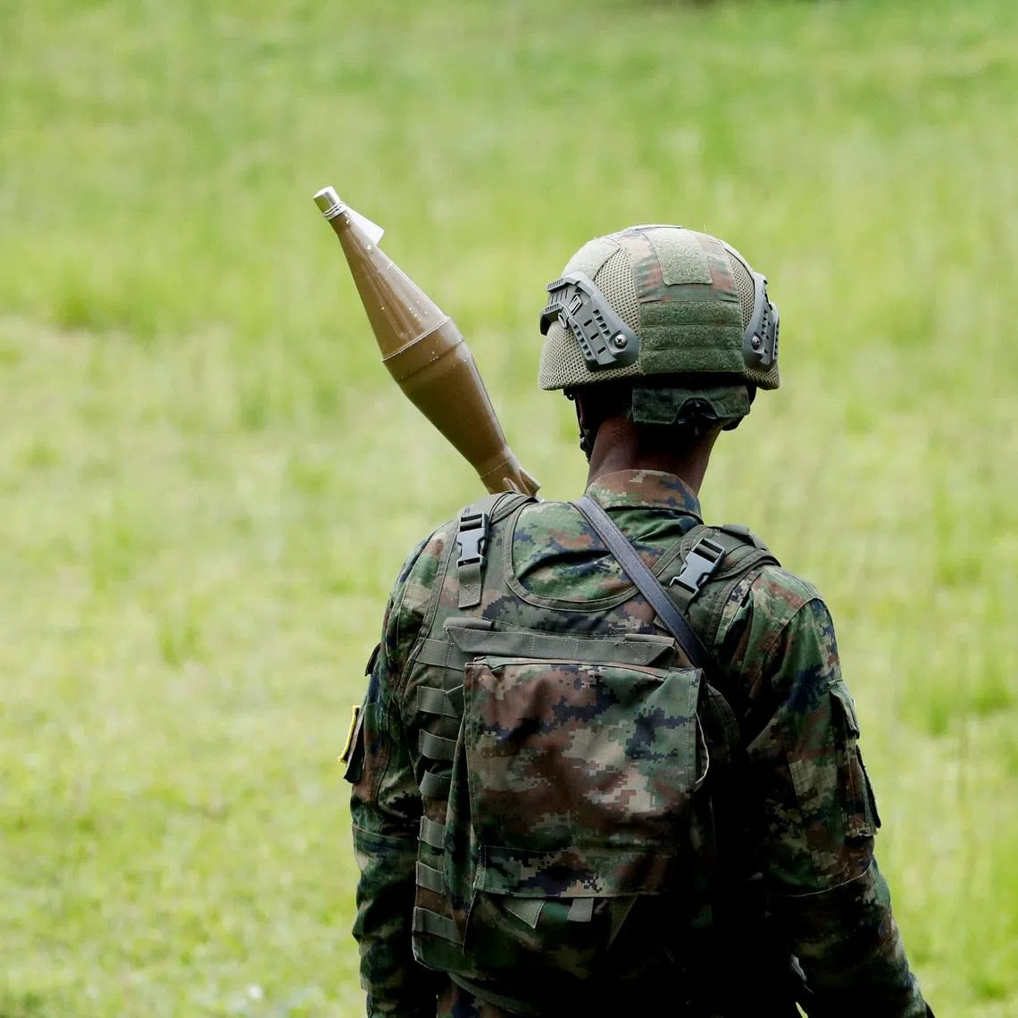 A Rwanda Defence Force (RDF) soldier stands in position at the Grande Barrier border amid clashes between M23 the Armed Forces of the Democratic Republic of the Congo (FARDC), at the border crossing point at Gisenyi, in Rubavu district, Rwanda, January 29, 2025. REUTERS/Thomas Mukoya