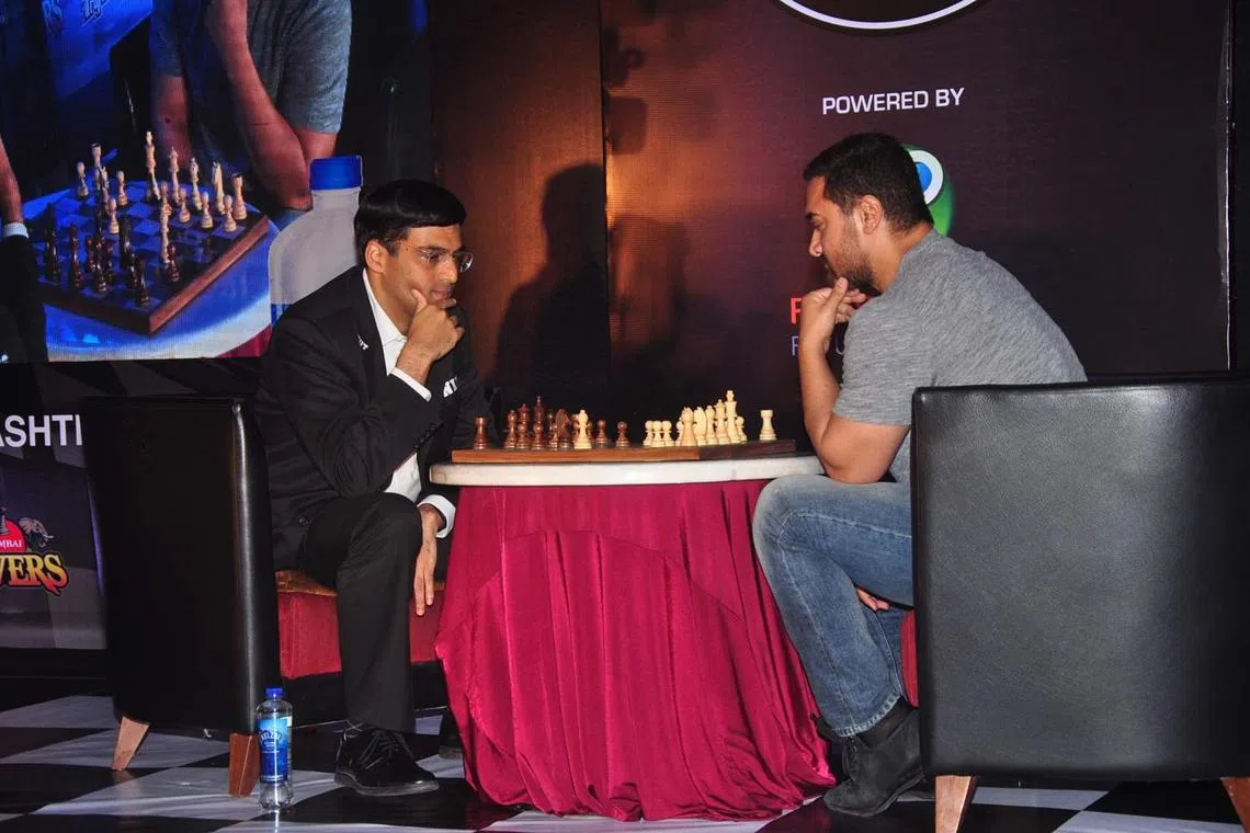 V. Anand, the five-time world chess champion, having a fun day of chess with Bollywood film star Aamir Khan in 2015. 