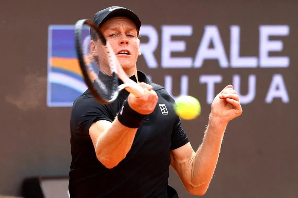 Italy's Jannik Sinner in action during his quarter final match against Russia's Andrey Rublev.
