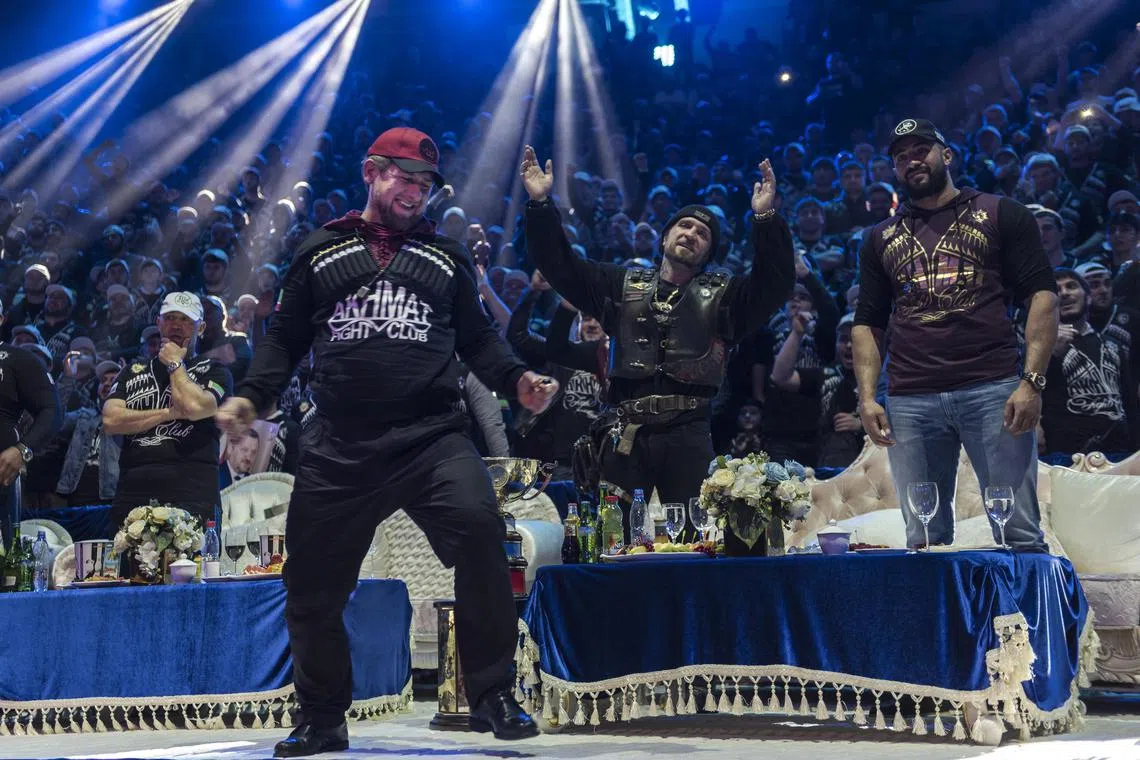 Ramzan Kadyrov celebrates during a mixed martial arts tournament in Grozny, Russia, on March 15, 2015.