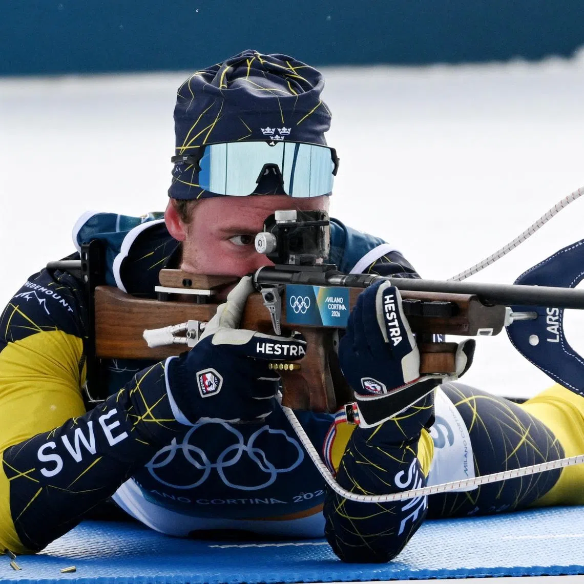 Milano Cortina 2026 Olympics - Biathlon - Men's 15km Mass Start - Anterselva Biathlon Arena, South Tyrol, Italy - February 20, 2026. Sebastian Samuelsson of Sweden in action during the men's 15km mass start REUTERS/Pawel Kopczynski
