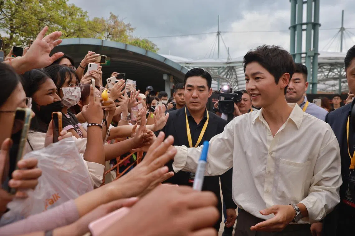 South Korean star Song Joong-ki meets fans following a press conference for K-drama Reborn Rich, at Hard Rock Hotel in Resorts World Sentosa on Dec 7, 2022.