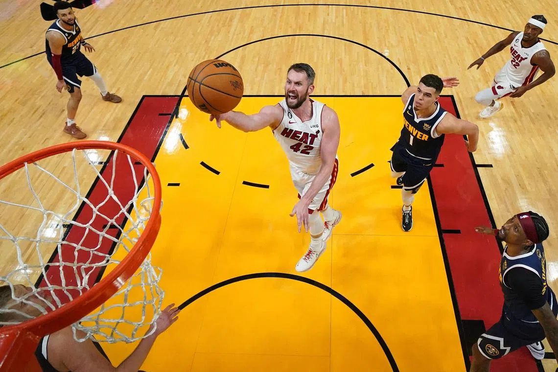 Miami Heat forward Kevin Love shooting against the Denver Nuggets during the second half in game four of the 2023 NBA Finals at Kaseya Centre.