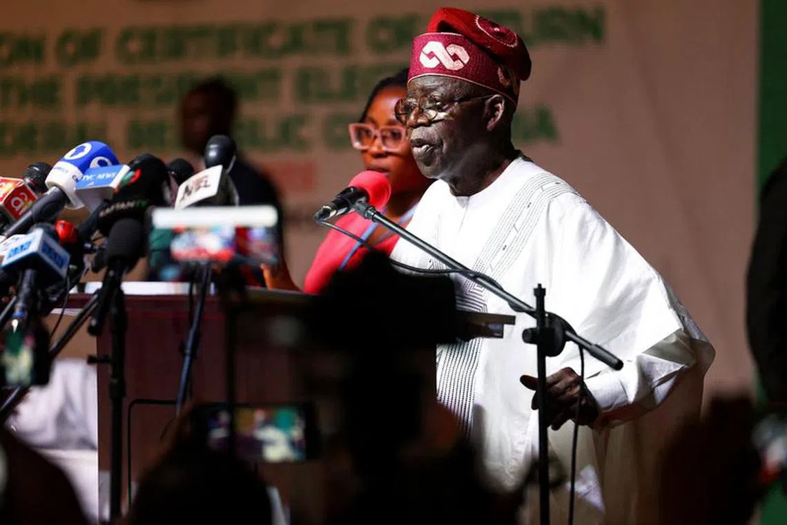 FILE PHOTO: Nigeria's newly declared winner of 2023 presidential election, Bola Tinubu speaks at the National Collation Centre in Abuja, Nigeria, March 1, 2023. REUTERS/Esa Alexander/File Photo
