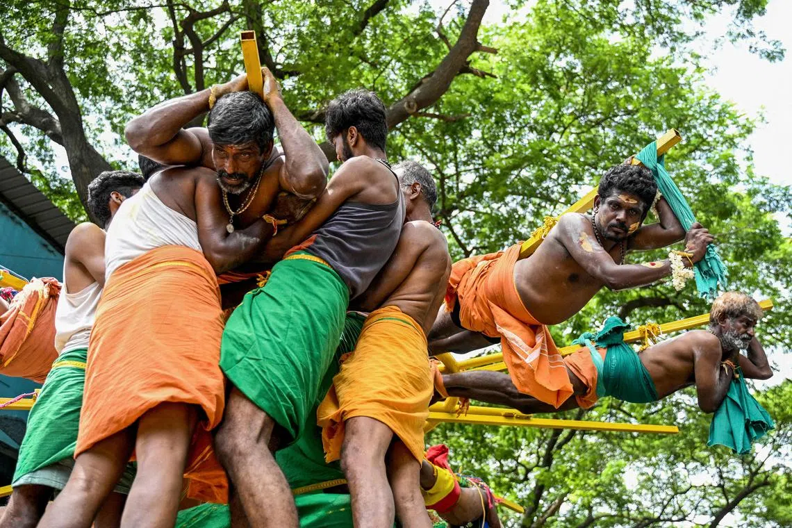 Hindu devotees taking part in a religious procession to celebrate 'Aadi' festival in Chennai, on July 27, 2025. 