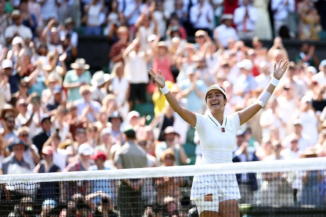 Philippines' Alexandra Eala celebrates beating Poland's Iga Swiatek during their women's singles third round tennis match on the sixth day of the 2026 Wimbledon Championships at The All England Lawn Tennis and Croquet Club in Wimbledon, southwest London, on July 4, 2026. (Photo by Henry NICHOLLS / AFP) / RESTRICTED TO EDITORIAL USE
