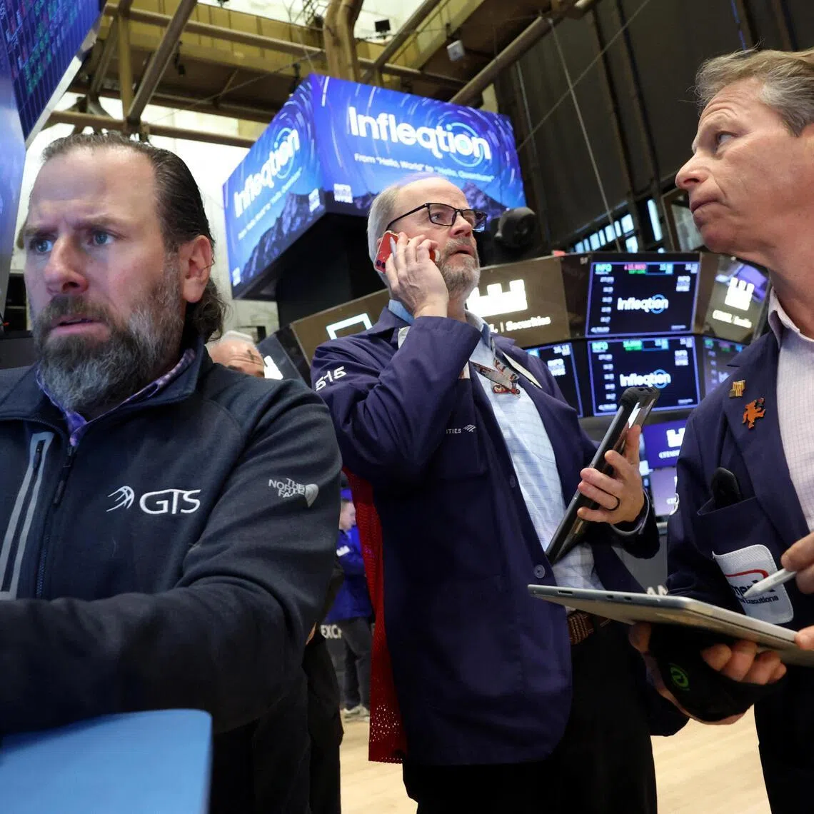 Traders working on the floor of the New York Stock Exchange, in New York City, on Feb 18.