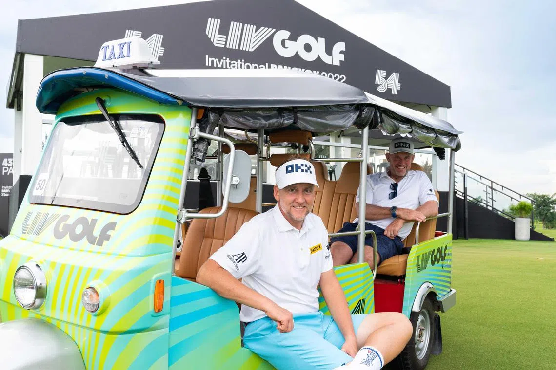 England's Ian Poulter (left) and Lee Westwood posing in a tuk-tuk ahead of the LIV Golf Invitational Bangkok at Stonehill golf course from Oct 7 to 9, 2022.
