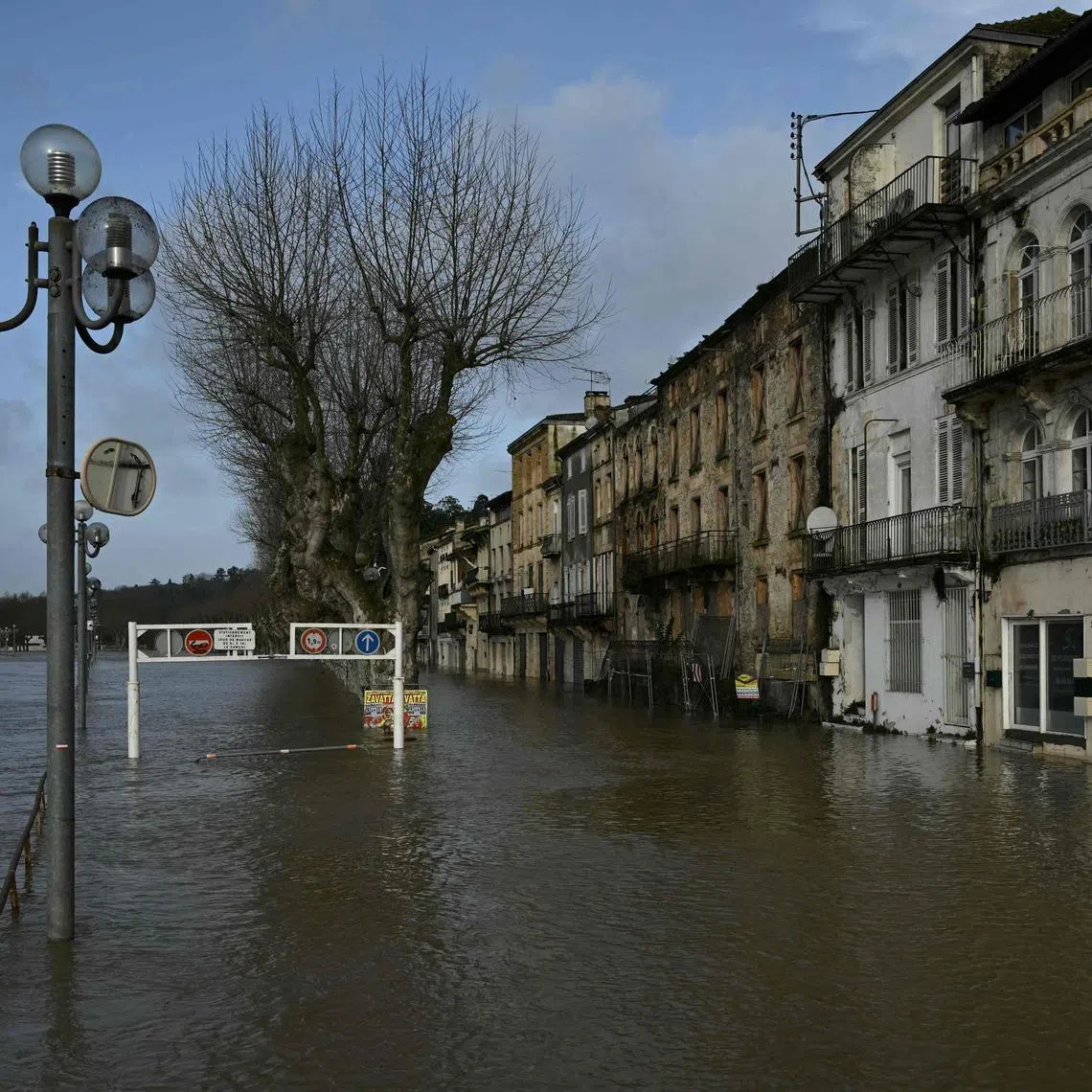 A flooded street in La Reole, south-western France, on Feb 12, amid Storm Nils, which has disrupted travel and brought chaos to roads in southern France, northern Spain and parts of Portugal.