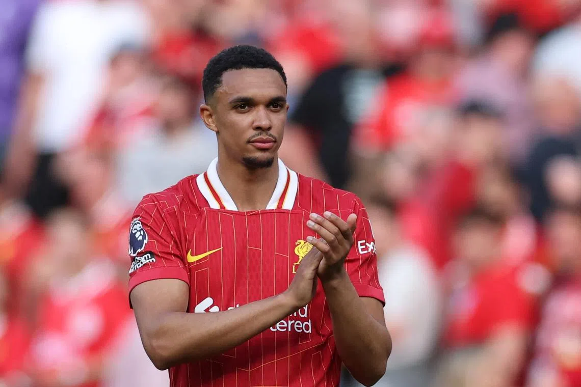 FILE PHOTO: Soccer Football - Premier League - Liverpool v Arsenal - Anfield, Liverpool, Britain - May 11, 2025 Liverpool's Trent Alexander-Arnold applauds fans after the match REUTERS/Phil Noble/File Photo
