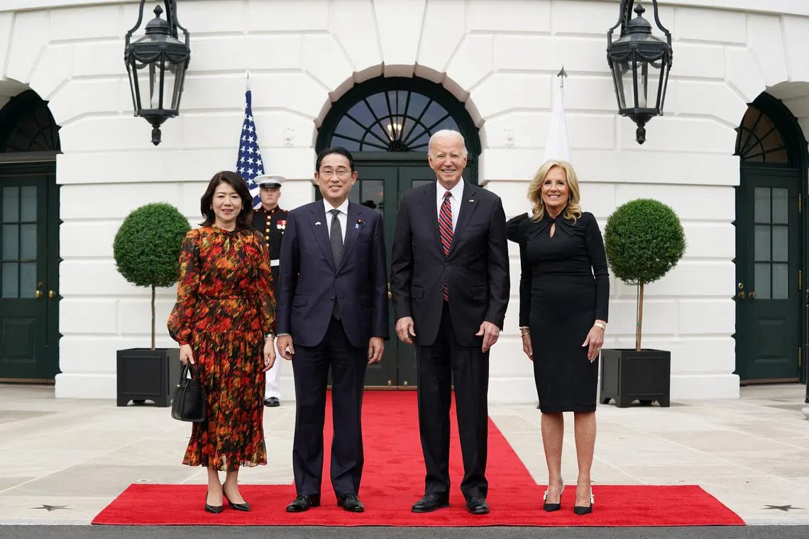 U.S. President Joe Biden and first lady Jill Biden welcome Japanese Prime Minister Fumio Kishida and his wife Yuko Kishida to the White House at the start of their state visit to Washington, U.S., April 9, 2024. REUTERS/Kevin Lamarque