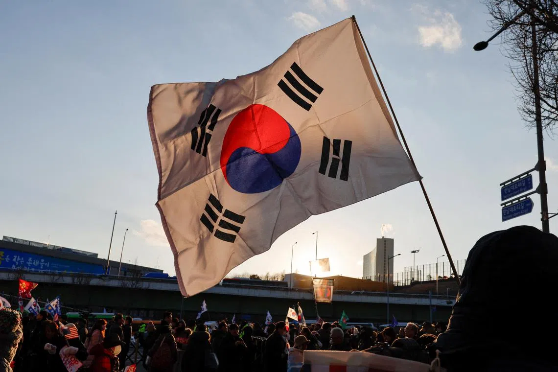 A South Korean flag flutters during a pro-Yoon protesters rally near impeached South Korean President Yoon Suk Yeol's official residence, on Jan 3.