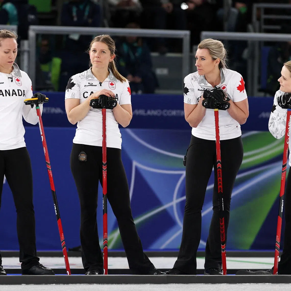 Milano Cortina 2026 Olympics - Curling - Women's Round Robin Session 4 - Great Britain vs Canada - Cortina Curling Olympic Stadium, Cortina d'Ampezzo, Italy - February 14, 2026. Sarah Wilkes of Canada, Emma Miskew of Canada, Tracy Fleury of Canada and Rachel Homan of Canada during their match against Britain REUTERS/Issei Kato