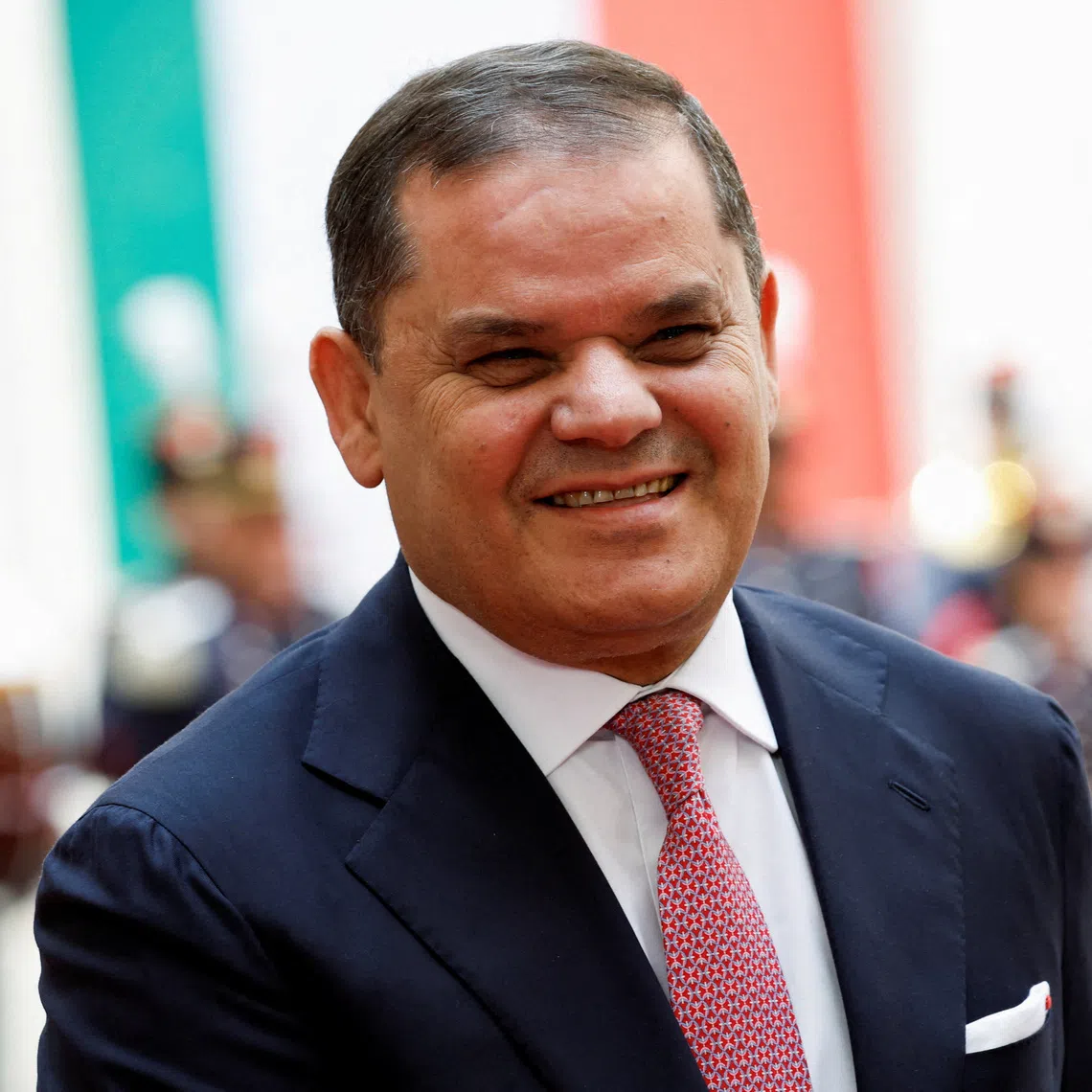 FILE PHOTO: The prime minister of Libya's U.N.-recognised Government of National Unity, Abdulhamid Dbeibah, reacts on the day he meets Italian Prime Minister Giorgia Meloni at Chigi Palace, in Rome, Italy, May 7, 2026. REUTERS/Remo Casilli/File Photo