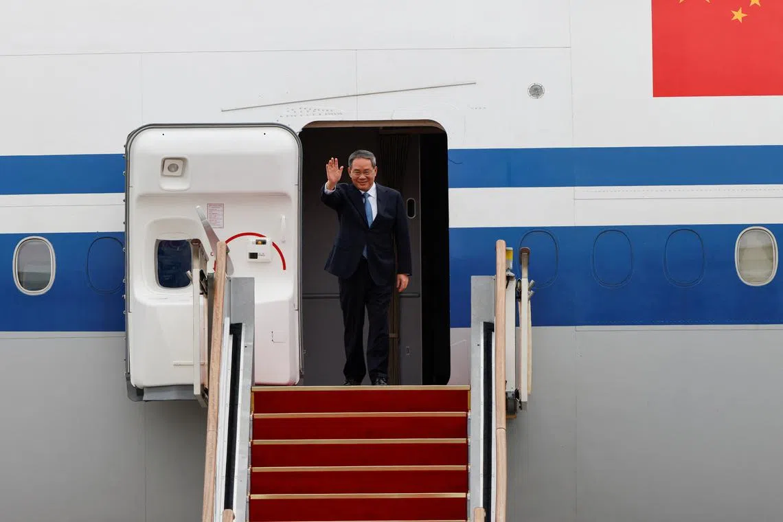 FILE PHOTO: Chinese Premier Li Qiang arrives to attend the trilateral summit with his South Korean and Japanese counterparts  in Seoul, South Korea, May 26, 2024. REUTERS/Kim Soo-hyeon/File Photo