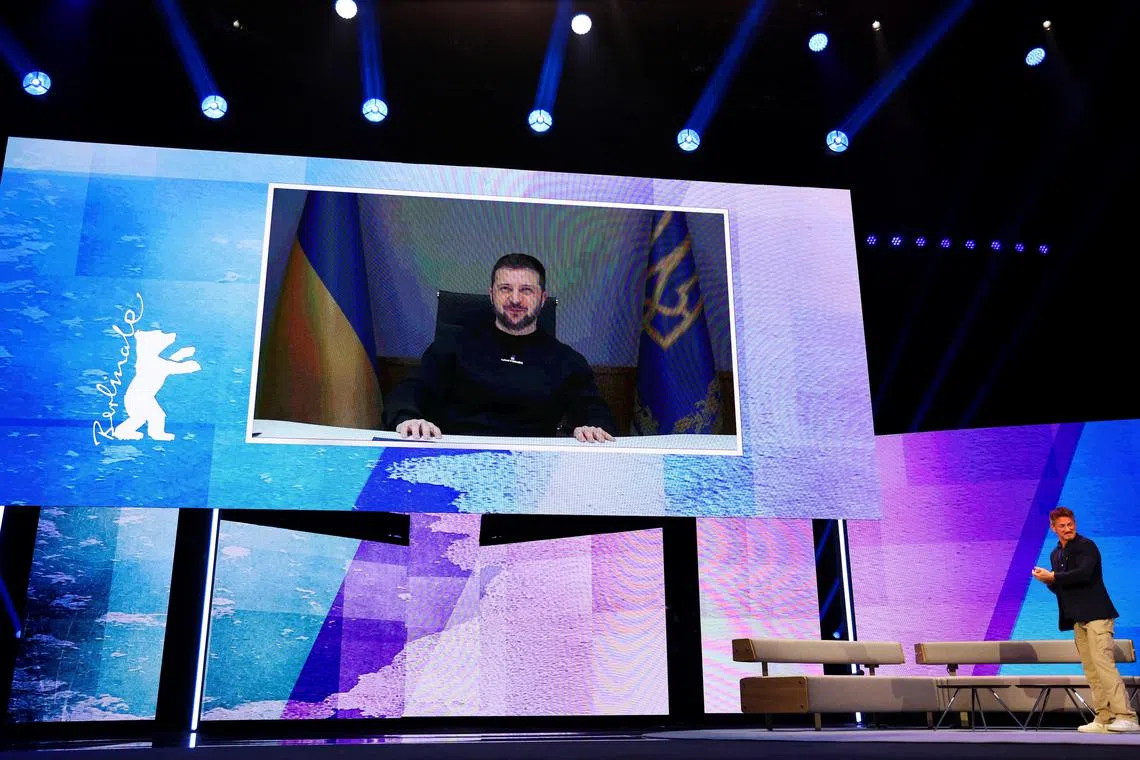 US director Sean Penn is joined by Ukraine President Volodymyr Zelensky via video link at the Berlin Film Festival on Feb 16, 2023.
