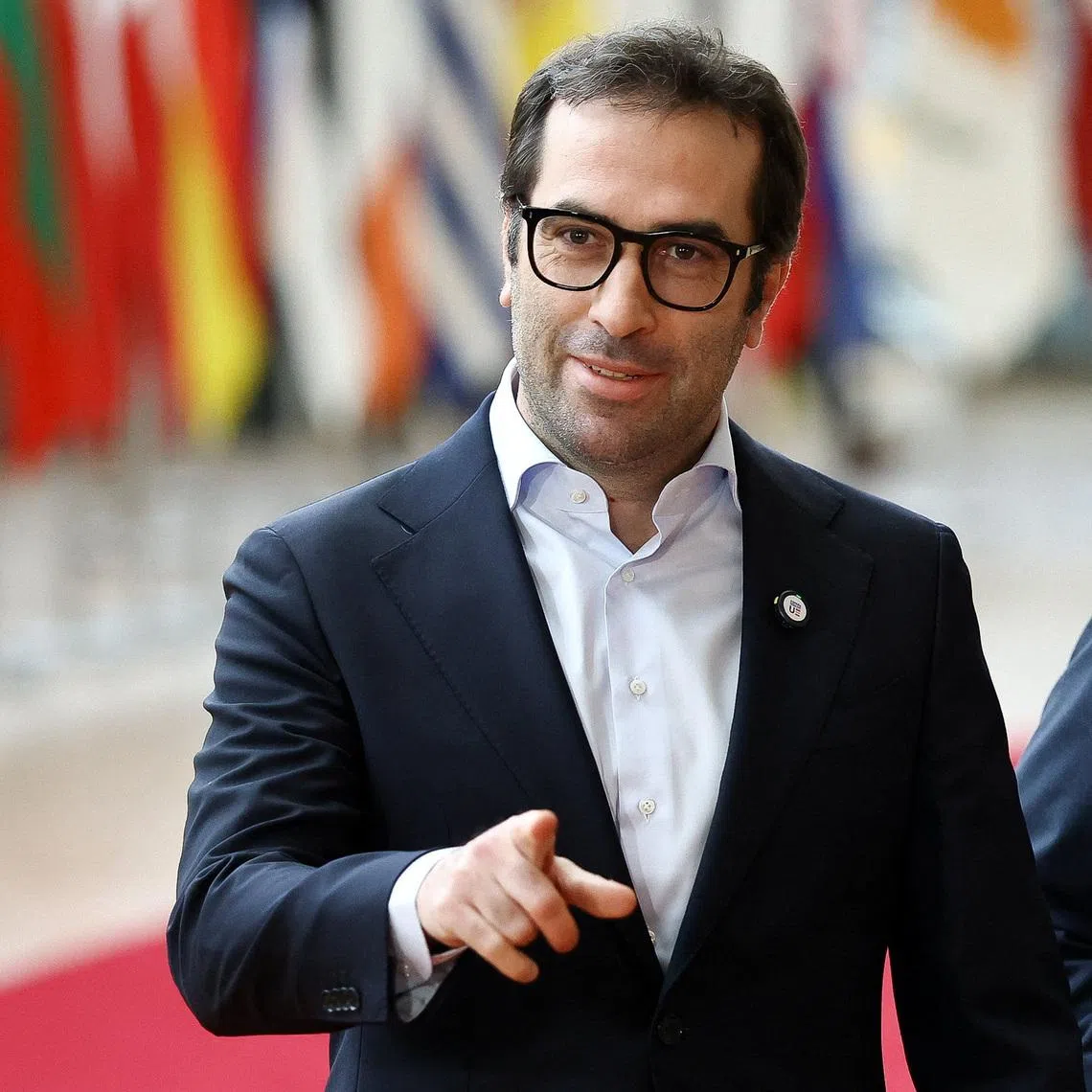 FILE PHOTO: Spanish Economy Minister Carlos Cuerpo gestures on the day of a Eurogroup Finance Ministers meeting in Brussels, Belgium December 11, 2025. REUTERS/Yves Herman/File Photo