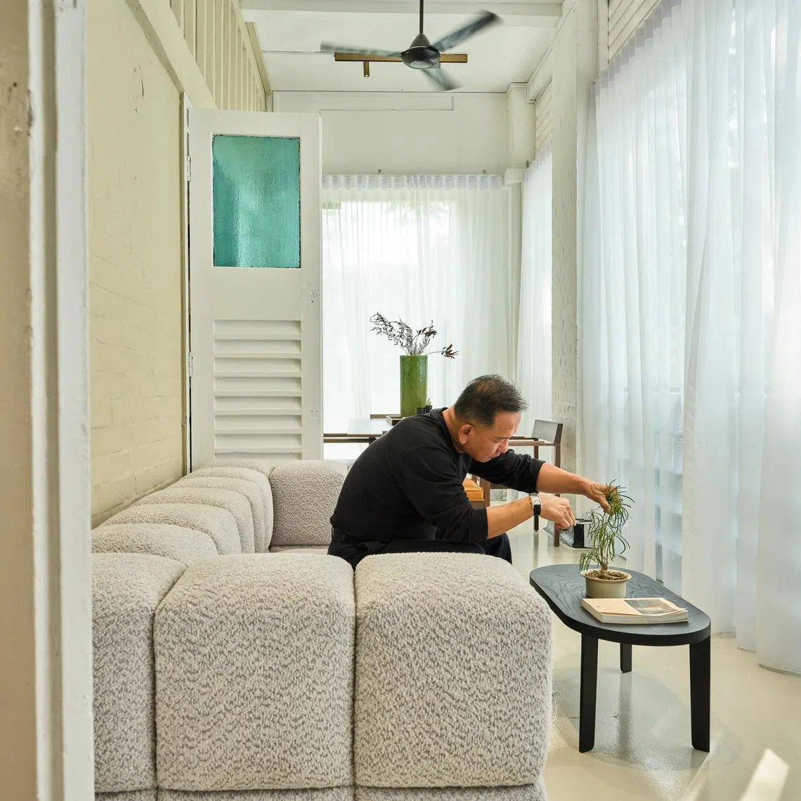 Nathan Home is the latest venture of renowned Singapore designer Nathan Yong, who is seen above the brand's Tetris Sofa.