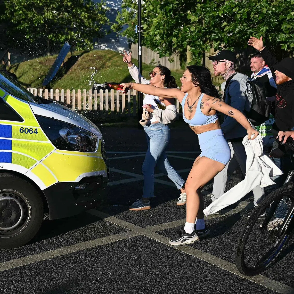 Demonstrators attacking a police van following a protest in Southampton, England, on June 2, over the case of murdered student Henry Nowak.
