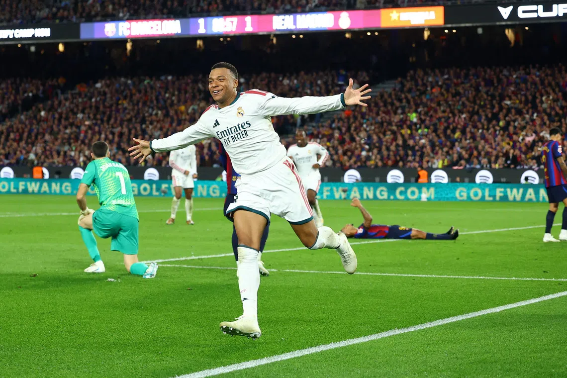 Real Madrid’s Kylian Mbappe celebrates after scoring a late winner against Barcelona on Oct 25.