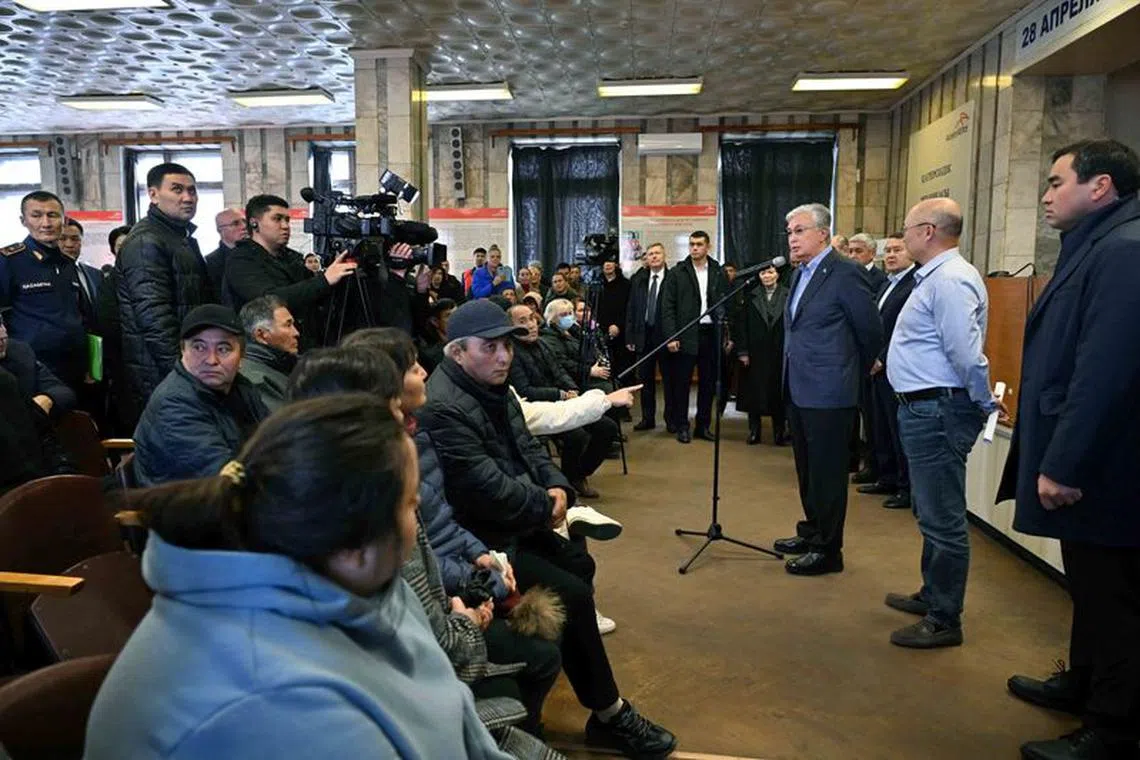Kazakh President Kassym-Jomart Tokayev meets with relatives of miners who died in a fire at the Kostenko coal mine operated by ArcelorMittal Temirtau in Karaganda Region, Kazakhstan October 28, 2023. Press service of the President of Kazakhstan/Handout via REUTERS