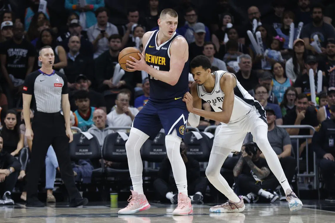 Denver Nuggets centre Nikola Jokic (left) in action against San Antonio Spurs centre Victor Wembanyama during the second half.