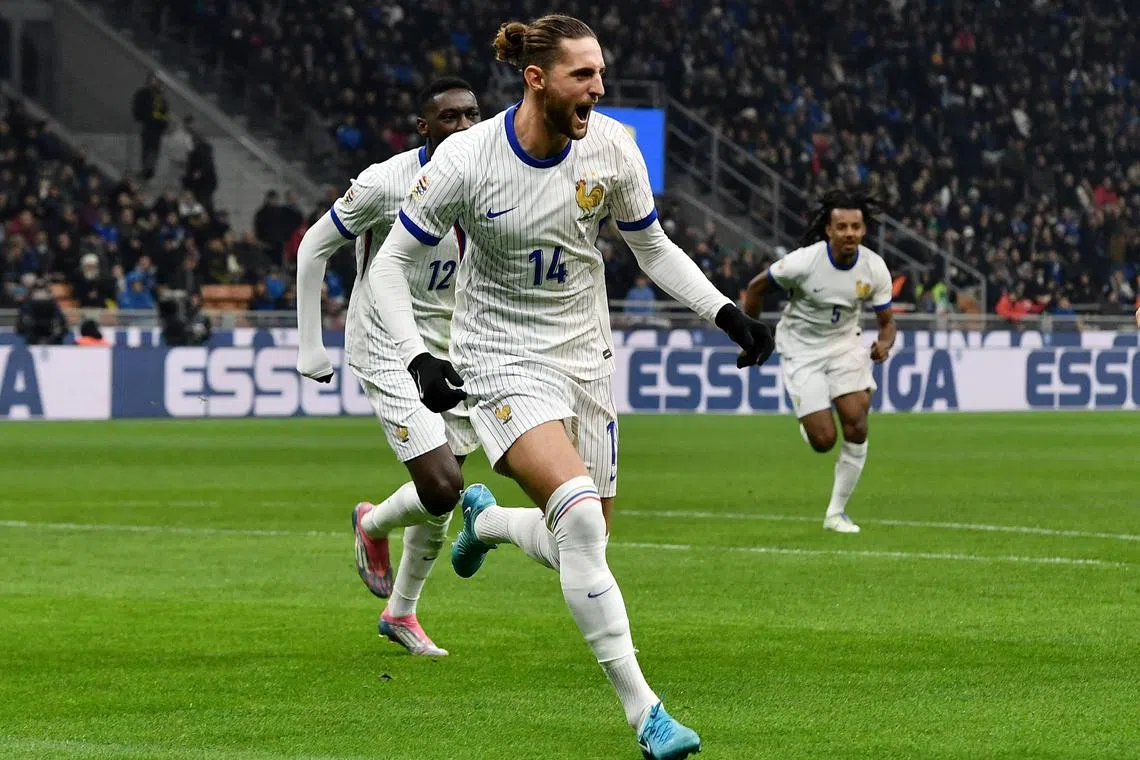 Adrien Rabiot celebrating after scoring the first of his two goals in France's 3-1 Nations League Group A2 win over Italy at the San Siro in Milan on Nov 17.