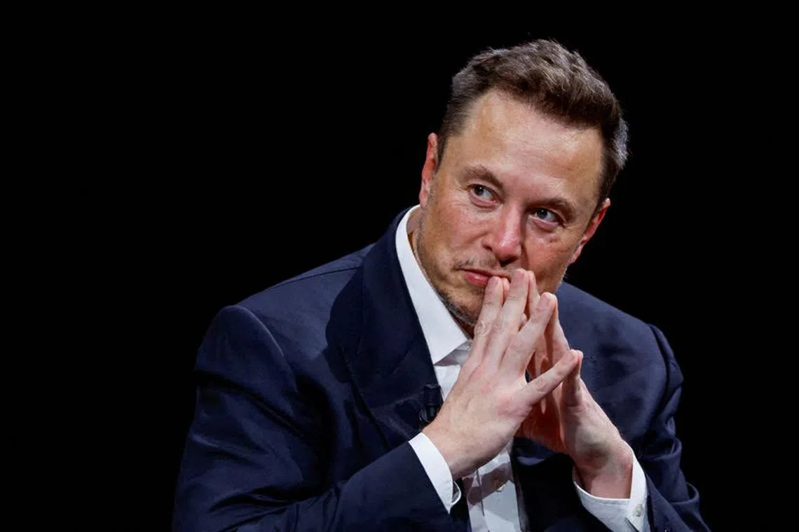 FILE PHOTO: Elon Musk, Chief Executive Officer of SpaceX and Tesla and owner of Twitter, gestures as he attends the Viva Technology conference dedicated to innovation and startups at the Porte de Versailles exhibition centre in Paris, France, June 16, 2023. REUTERS/Gonzalo Fuentes/File Photo