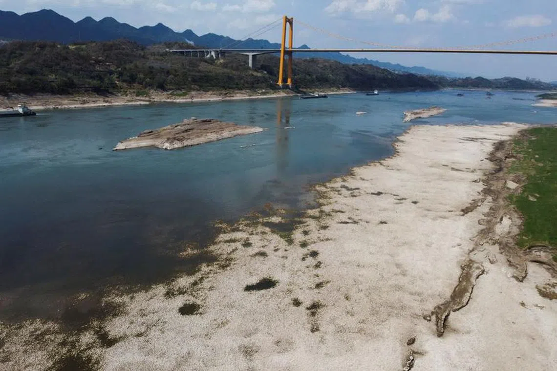 FILE PHOTO-An aerial view shows the Yangtze river that is approaching record-low water levels during a regional drought in Chongqing, China, August 20, 2022. REUTERS/Thomas Peter/File Photo