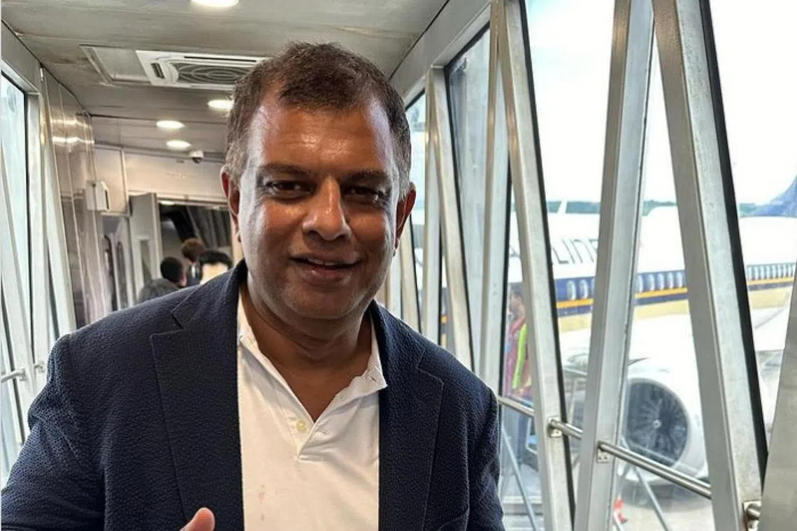 AirAsia chief Tony Fernandes said he had to travel on Singapore Airlines because his own planes were sold out.