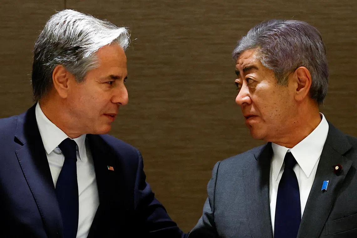US Secretary of State Antony Blinken interacts with Japanese Foreign Minister Takeshi Iwaya at a working lunch in Tokyo on Jan 7, 2025.