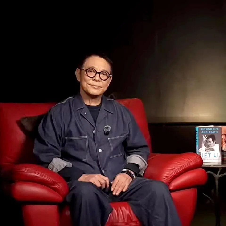Martial arts legend Jet Li (left) with his daughter Jada (right) during an interview uploaded to his YouTube page on June 25, 2006.