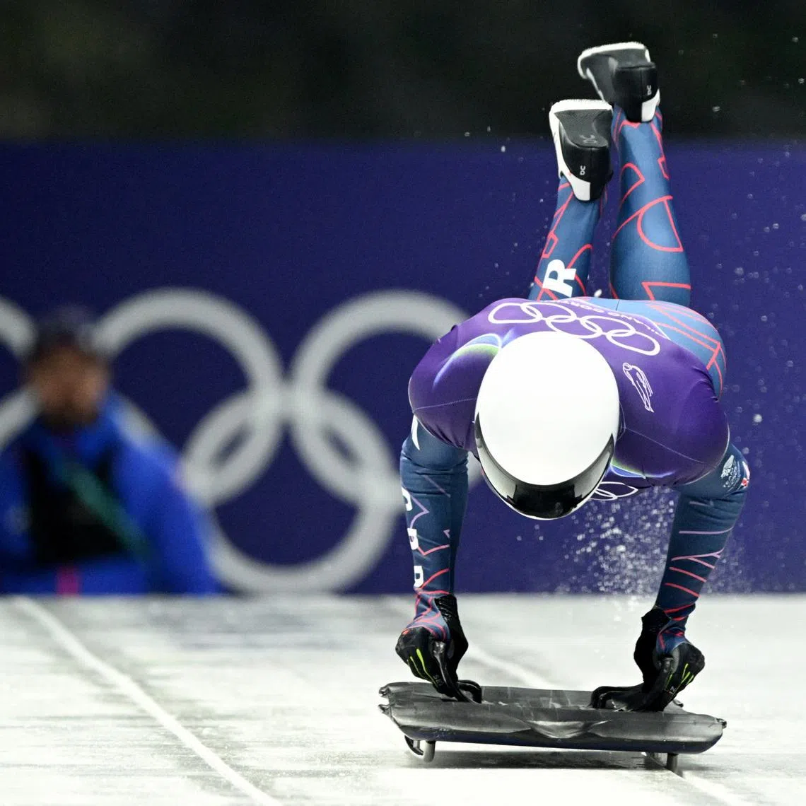 Milano Cortina 2026 Olympics - Skeleton - Men Heat 1 - Cortina Sliding Centre, Cortina d'Ampezzo, Italy - February 12, 2026. Matt Weston of Britain in action during his first run REUTERS/Annegret Hilse