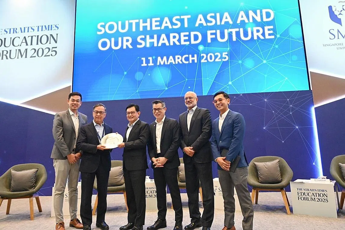 The Straits Times Education Forum 2025 on March 11, 2025 at SMU . From left : 
From left : Mr Aaron Tan - Co -founder, Carro and SMU Alumnus ; Prof Alan Chan - SMU Provost-Designate, Singapore Management University ; DPM Heng Swee Keat ; Jamie Ho , Editor , The Straits Times and Mr Aldi Haryopratomo - Investor and Entrepreneur.