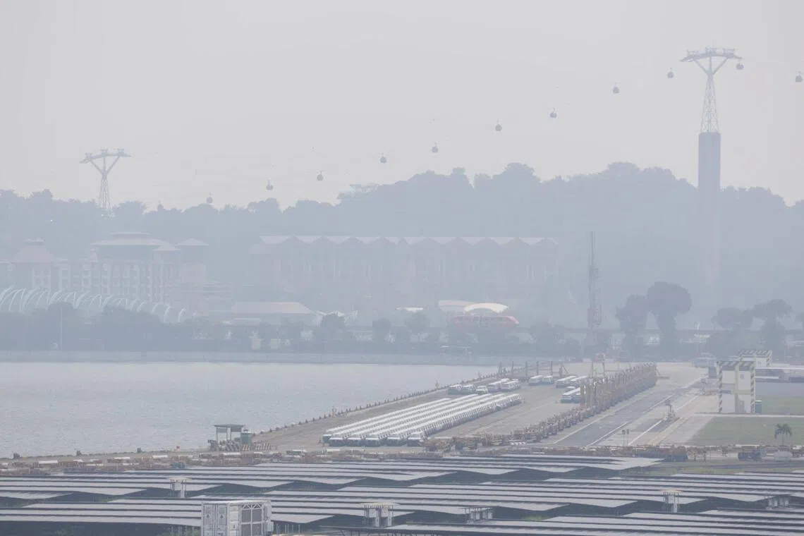 Hazy conditions seen from Tanjong Pagar Distripark towards Sentosa at 2:52pm on Sept 15.