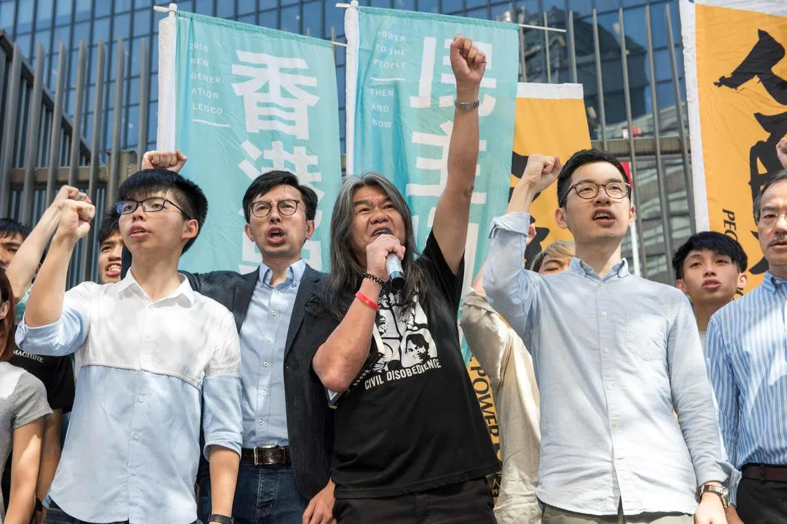 Pro-democracy lawmaker Leung Kwok-hung (third from left), also known as "Long Hair", at a protest in Hong Kong in 2017. 
