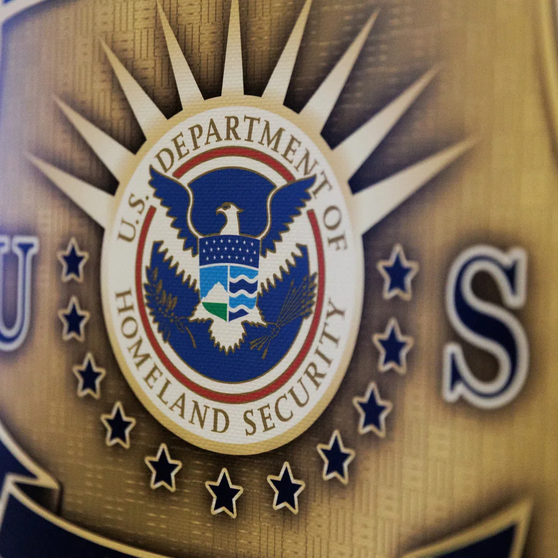 The seal of the U.S. Department of Homeland Security is seen in Arlington, Texas, U.S. August 26, 2025.  REUTERS/Shelby Tauber