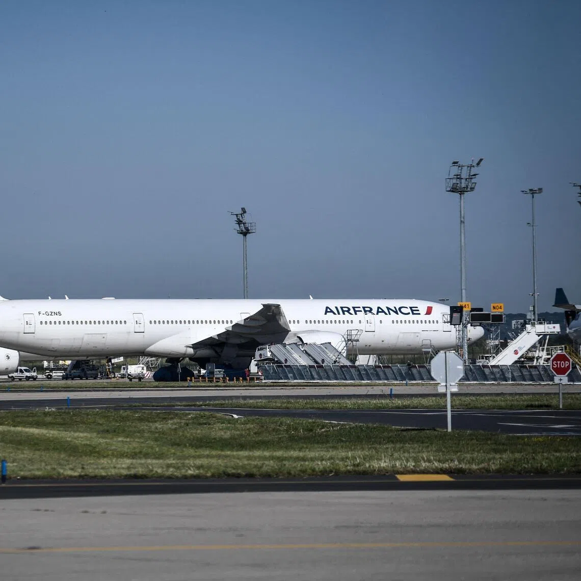 (FILES) A photograph taken on June 24, 2020, shows Air France planes parked on the tarmac at the Terminal 3 of the Orly airport, in Orly on the outskirts of Paris, a few days before its reopening as France eases lockdown measures taken to curb the spread of the COVID-19 (the novel coronavirus). Air France is leaving Paris Orly Airport on March 28, 2026 to refocus its operations on Roissy Paris-Charles de Gaulle Airport, which will continue to serve routes to Nice, Toulouse and Marseille. The last flight bearing the French airline’s livery is a Nice-Paris service due to land at Orly at 9.55 pm, Air France told AFP. (Photo by STEPHANE DE SAKUTIN / AFP)