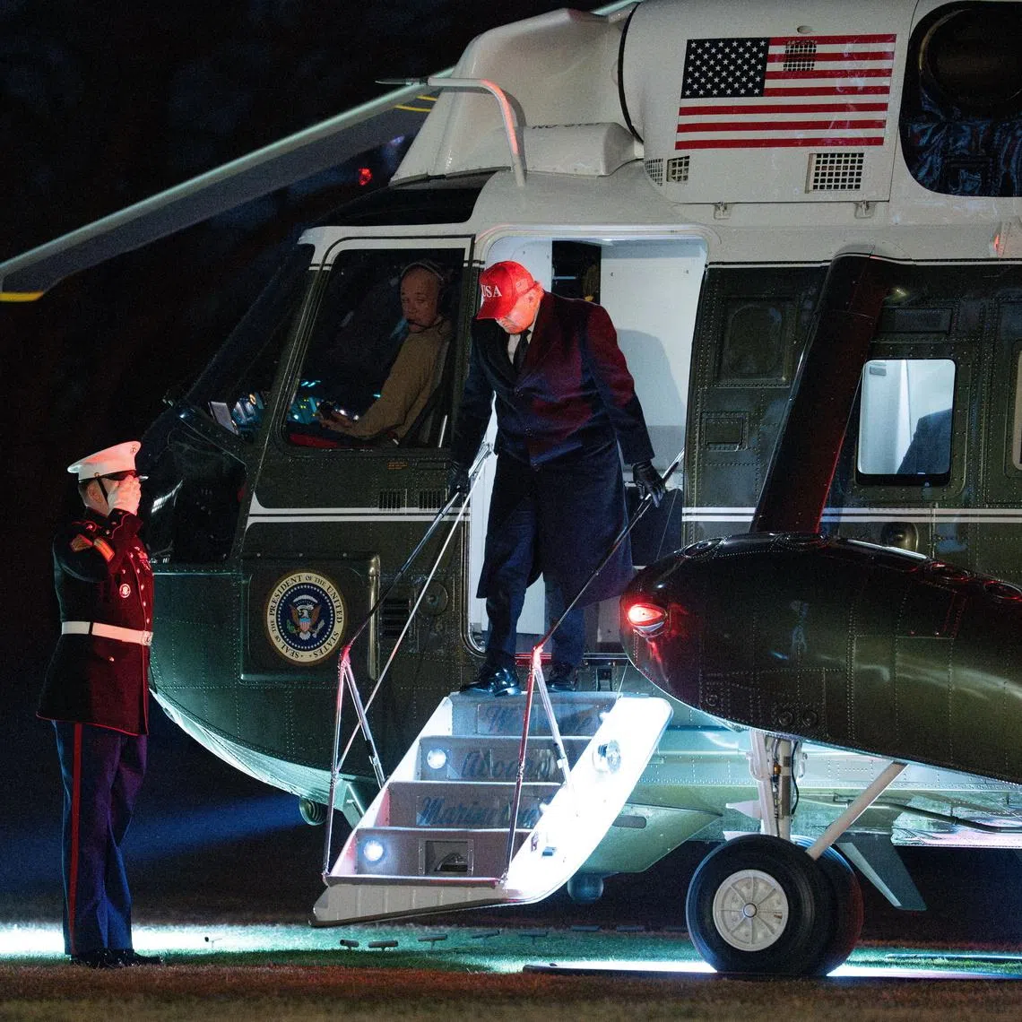 US President Donald Trump exiting the Marine One helicopter as he returned to the White House on March 1.
