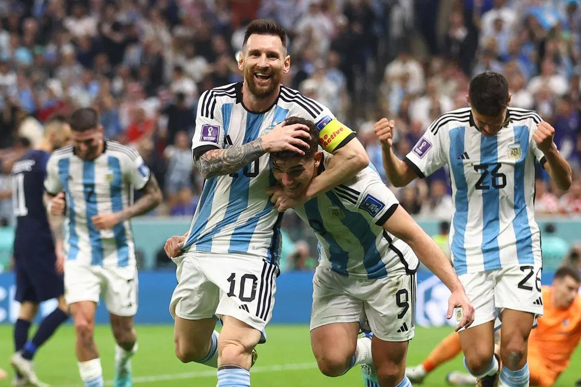 Soccer Football - FIFA World Cup Qatar 2022 - Semi Final - Argentina v Croatia - Lusail Stadium, Lusail, Qatar - December 13, 2022
Argentina's Julian Alvarez celebrates scoring their second goal with Lionel Messi REUTERS/Carl Recine