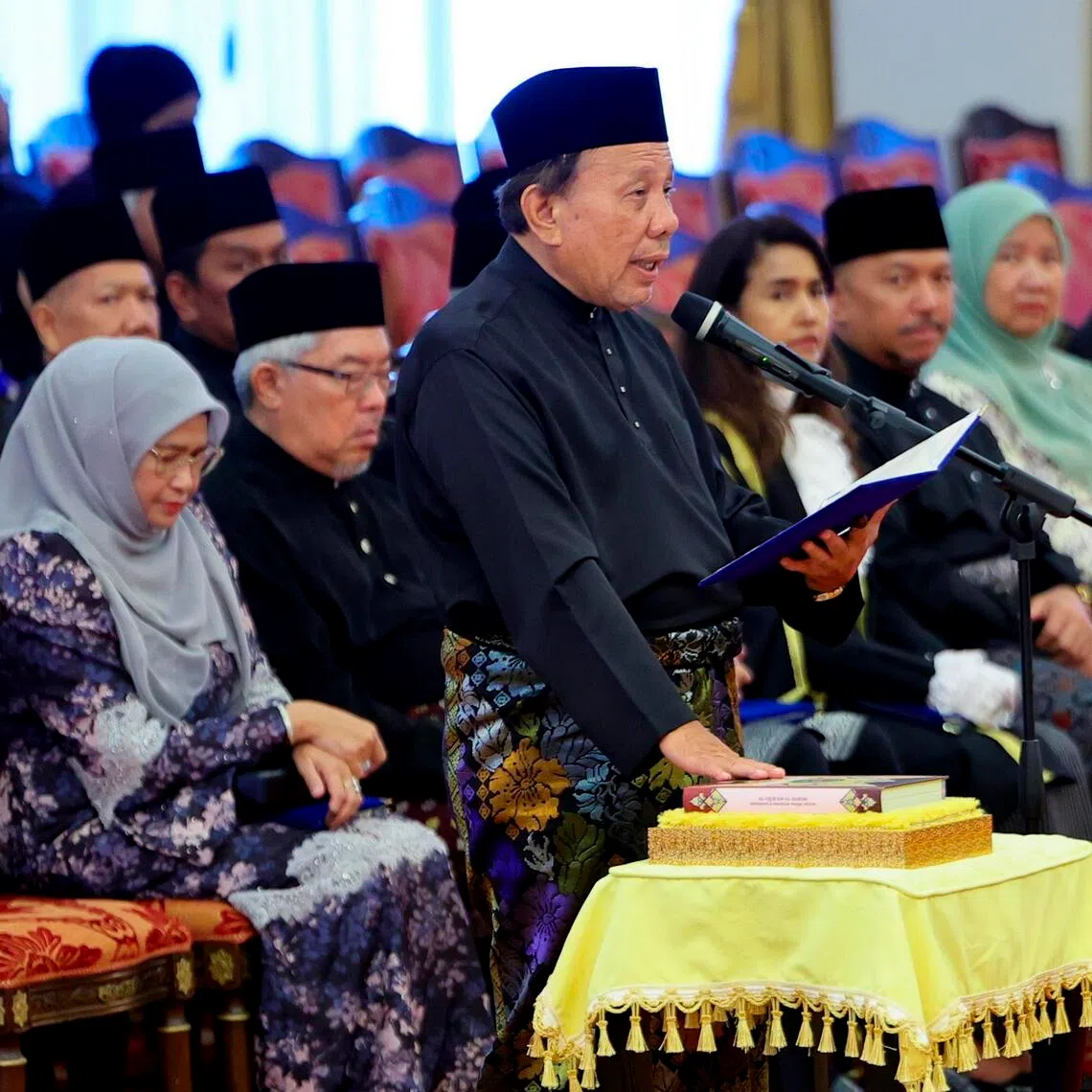 Veteran Ismail Lasim, who has been an UMNO assemblyman since 1999, being sworn in as Negeri Sembilan chief minister on Aug 2 after PH lost the state a day earlier.