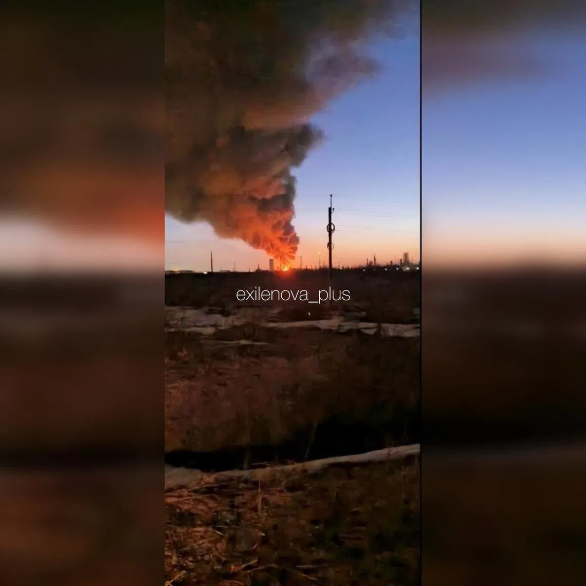 An image uploaded to social media that is said to show Russia's Yaroslavl oil refinery ablaze after a Ukrainian strike.