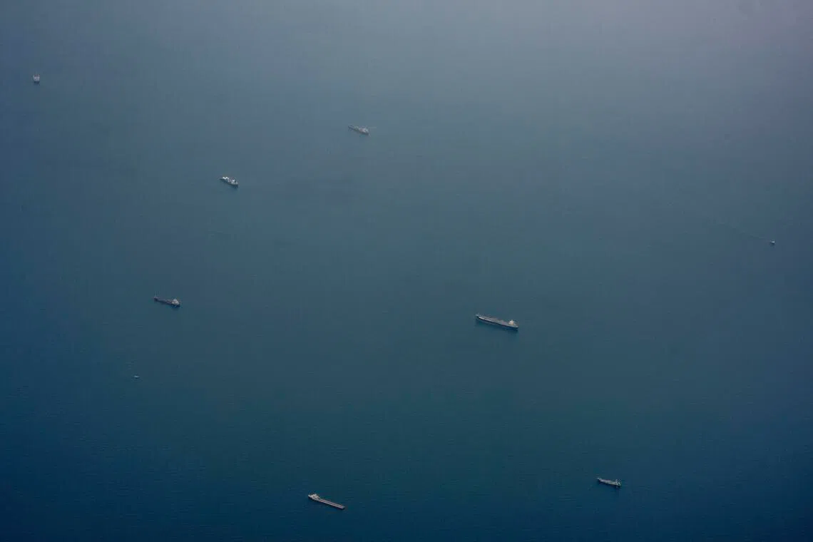 Ships near the Strait of Hormuz, as seen from a plane near the United Arab Emirates, on July 20.