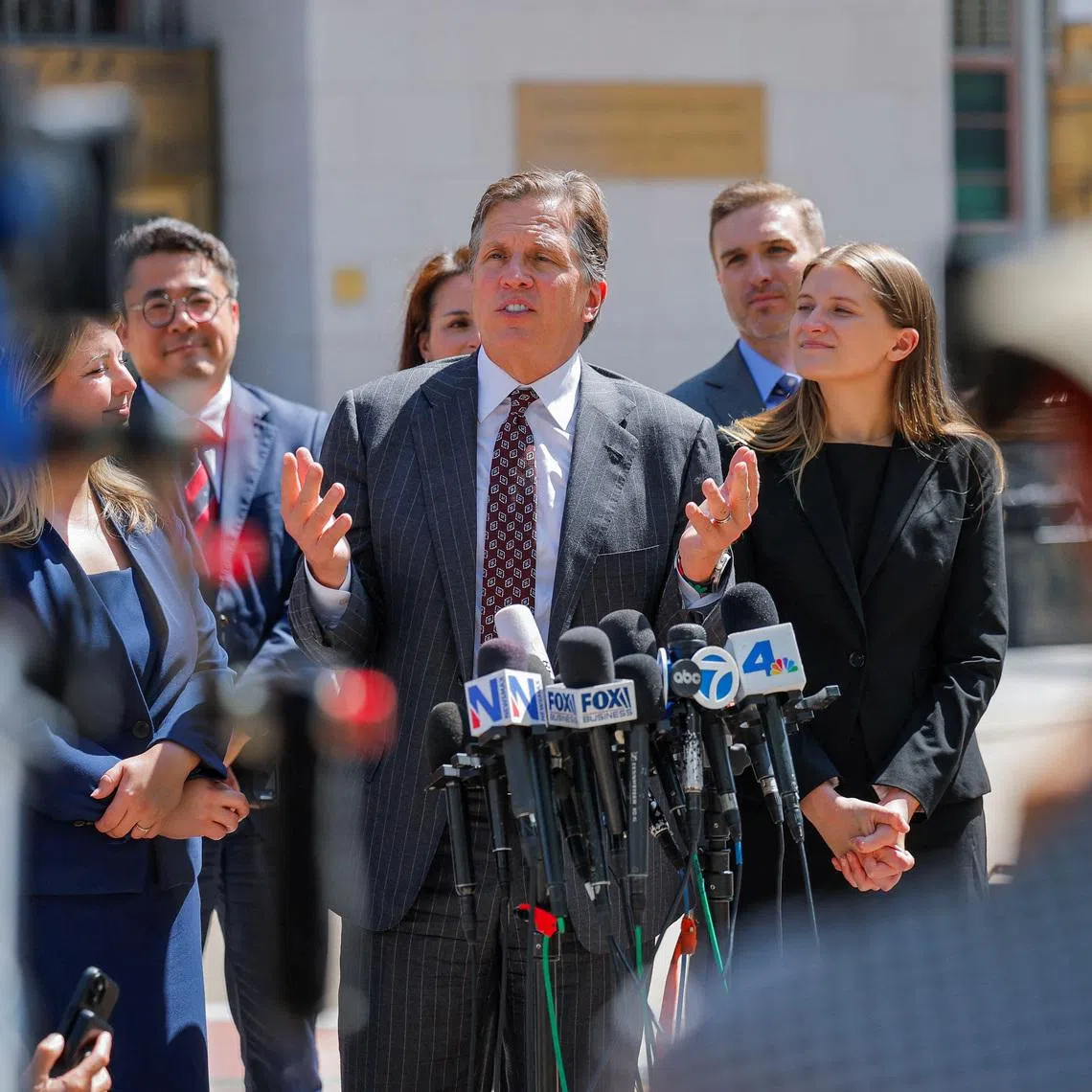 Lawyer Mark Lanier, of the plaintiff Kaley G.M., speaks with the media outside the court after the jury found Meta and Google liable in a key test case accusing Meta and Google's YouTube of harming children's mental health through addictive social media platforms, in Los Angeles, California, U.S., March 25, 2026. REUTERS/Mike Blake