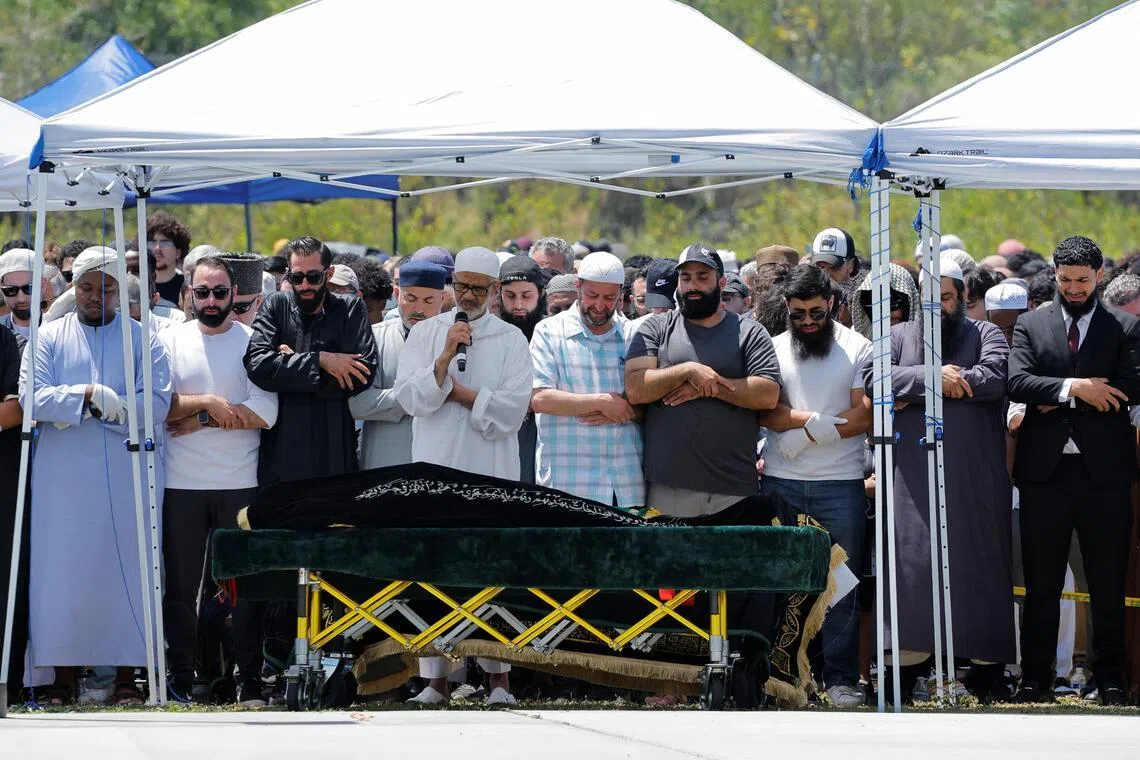 People attend a prayer service for the victims of a shooting at the Islamic Center, in San Diego, California, on May 21.