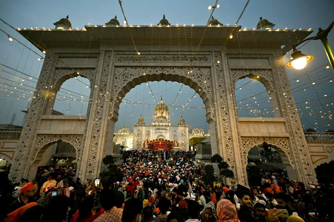 Devotees visiting Gurudwara Bangla Sahib on the occasion of the birth anniversary of Guru Nanak Dev, the founder of Sikhism, in New Delhi on Nov27, 2023.