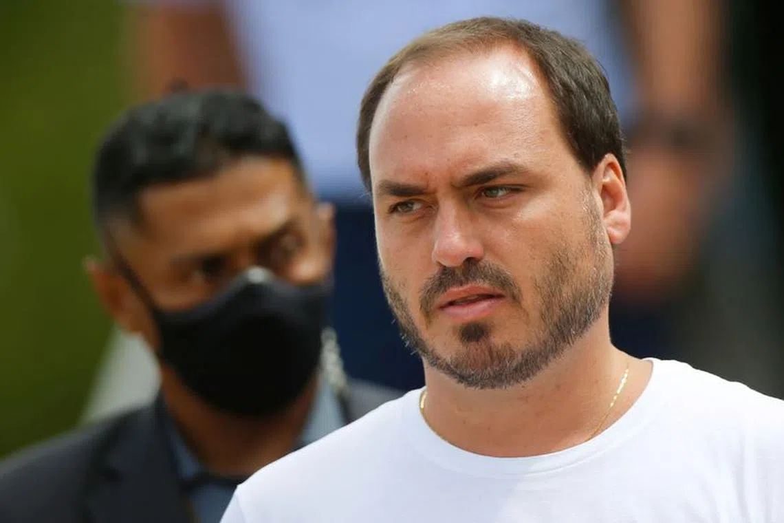 Carlos Bolsonaro, son of Brazil's President Jair Bolsonaro, walks after the 7th day mass in honour of President Bolsonaro's mother in Brasilia, Brazil, January 27, 2022. REUTERS/Adriano Machado/File Photo
