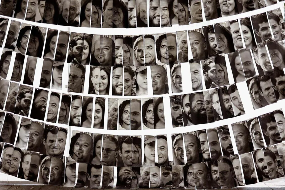 An installation displaying pictures of hostages kidnapped during the deadly Oct 7, 2023 attack by Hamas, in Tel Aviv, Israel, Nov 14, 2024. 