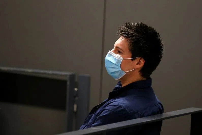 Rui Pinto, the Portuguese man believed to be the mastermind behind Football Leaks, waits before his trial at the court in Lisbon on Sept 4, 2020.