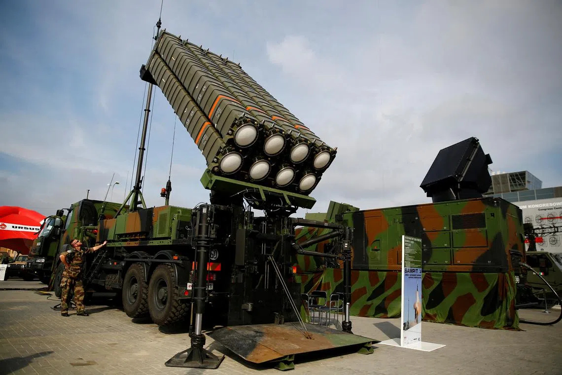 FILE PHOTO: Soldiers present an anti-missile system SAMP/T by Thales at an international military fair in Kielce, southern Poland September 2, 2014.  Picture taken on September 2, 2014. REUTERS/Kacper Pempel/File Photo